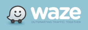 Waze logo with a car and the words'outsourcing traffic together'.