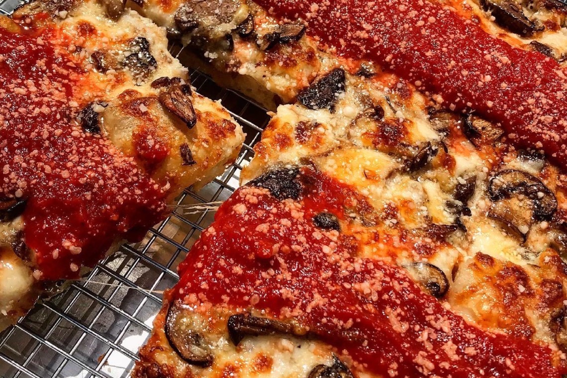 Underground mushroom pizza debuts on a cooling rack in Towson.